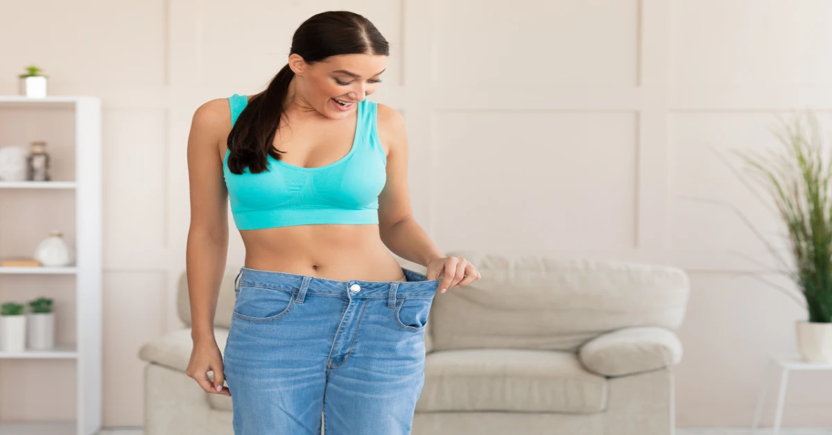 a picture of a woman in a pants that is too big for her