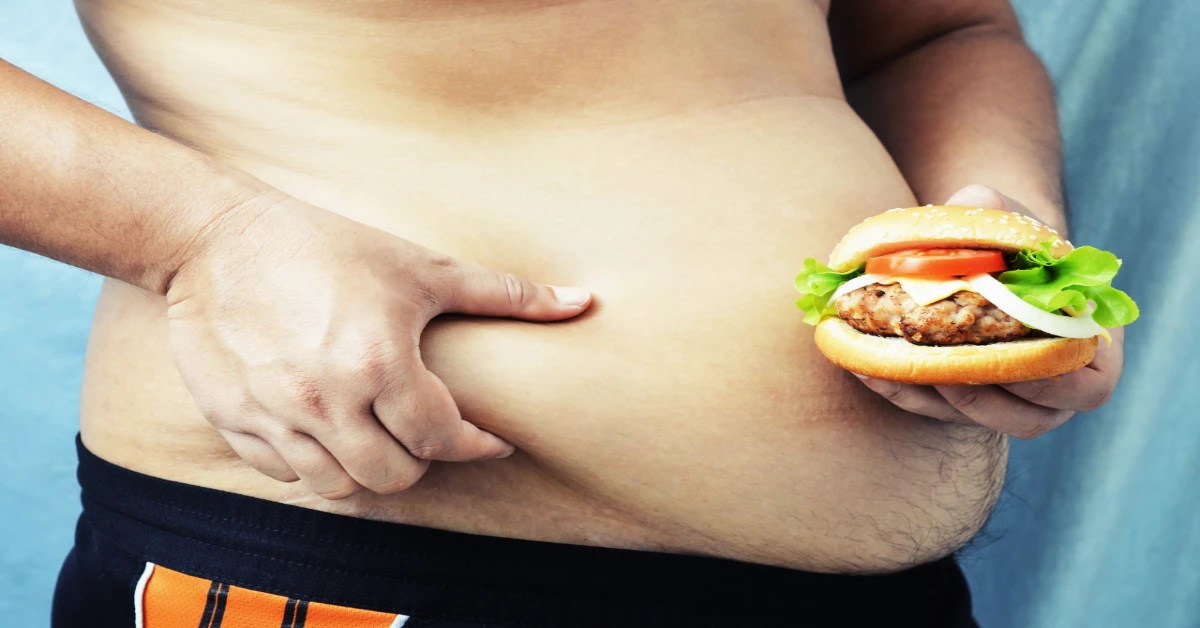 guys with a big tummy hanging over his pants
