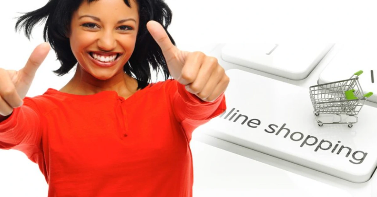 A picture of woman in a red dress showing a thumbs up