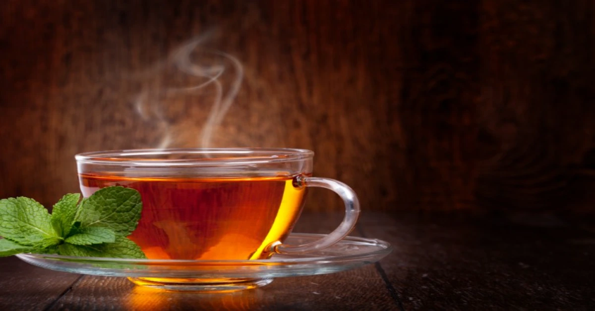 a clear cup of black tea